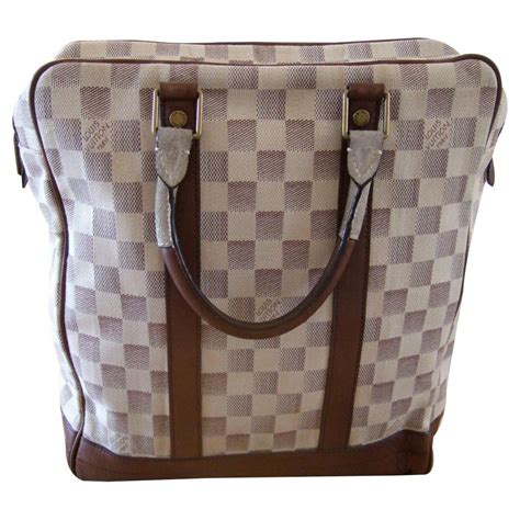 louis vuitton black checkered bag.